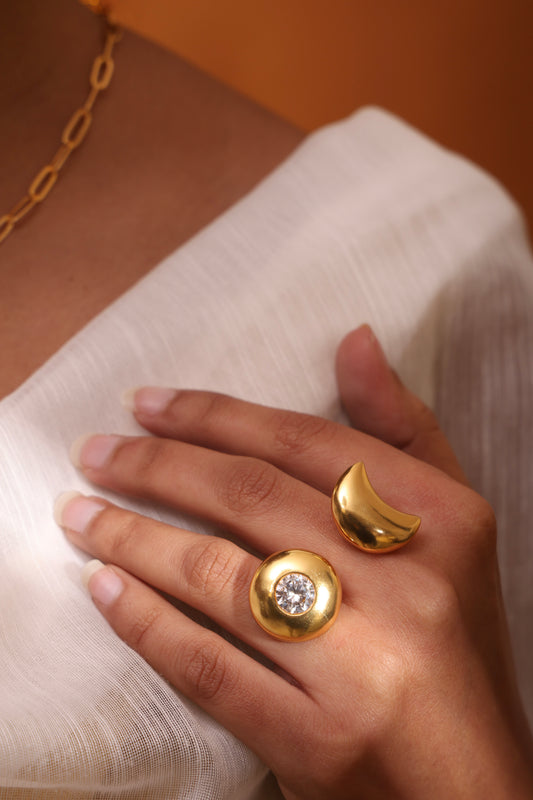 Orbit of Light Ring paired with a bold full moon disc set with a brilliant crystal