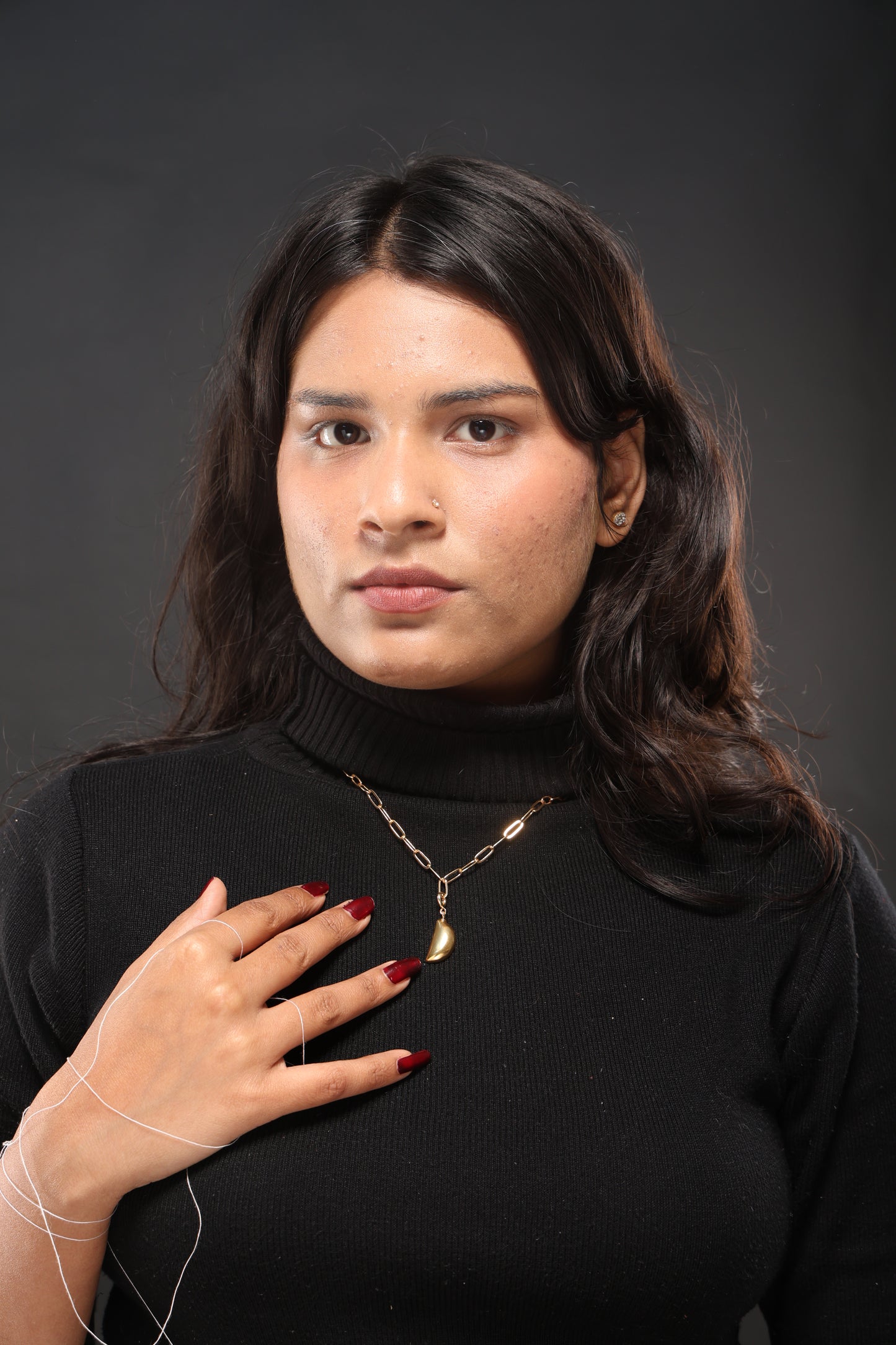 Divine Teardrop Charm as a necklace