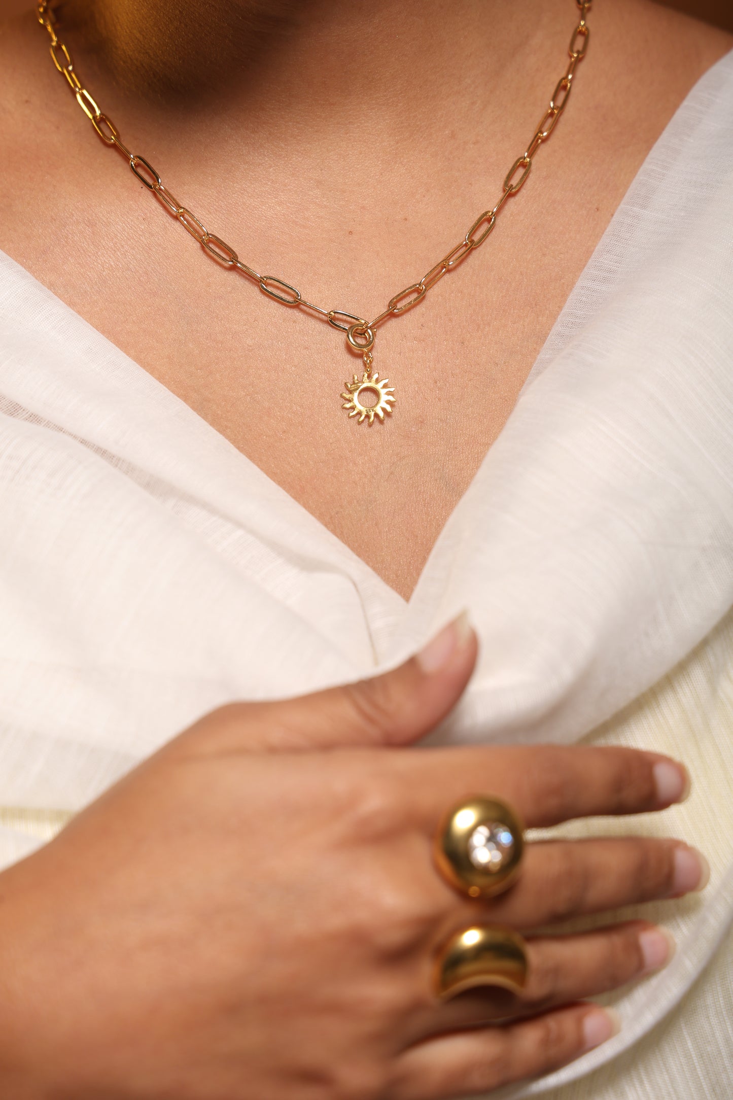 Golden Symbolic Sunburst Charm